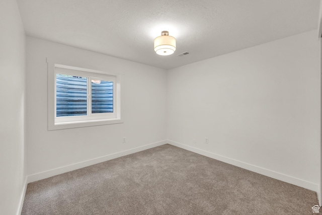 1128 N 850 E, Pleasant Grove, UT 84062 - carpeted empty room featuring baseboards and a textured ceiling