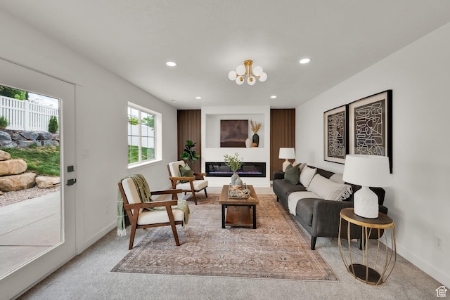 1128 N 850 E, Pleasant Grove, UT 84062 - carpeted living room with recessed lighting, baseboards, a chandelier, and a glass covered fireplace