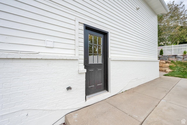 1128 N 850 E, Pleasant Grove, UT 84062 - property entrance featuring fence and a patio area