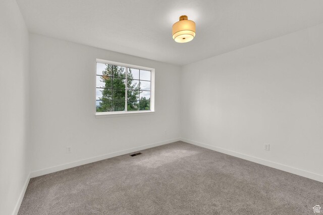 1128 N 850 E, Pleasant Grove, UT 84062 - carpeted empty room featuring baseboards