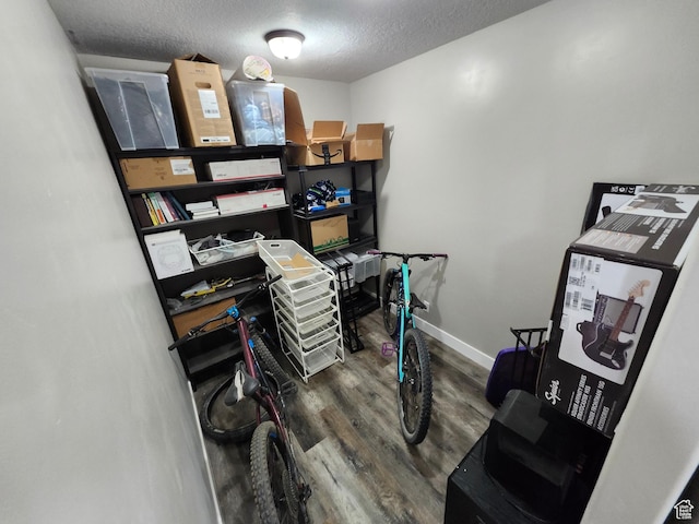 9362 N Sunnyvale Dr, Eagle Mountain, UT 84005 - office featuring wood finished floors, a textured ceiling, and baseboards