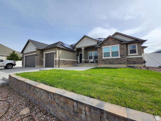 9362 N Sunnyvale Dr, Eagle Mountain, UT 84005 - craftsman house with board and batten siding, a garage, a porch, solar panels, and concrete driveway