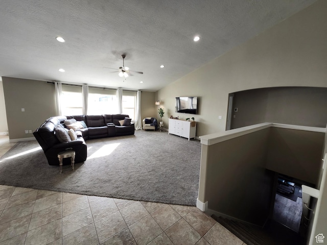 9362 N Sunnyvale Dr, Eagle Mountain, UT 84005 - carpeted living room with ceiling fan, baseboards, recessed lighting, a textured ceiling, and tile patterned flooring