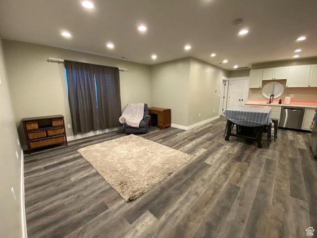9362 N Sunnyvale Dr, Eagle Mountain, UT 84005 - living area featuring dark wood-style flooring, baseboards, and recessed lighting
