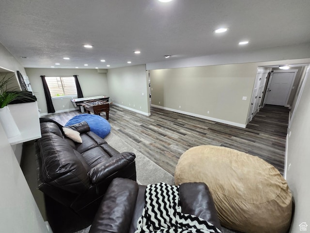 9362 N Sunnyvale Dr, Eagle Mountain, UT 84005 - living room with billiards, wood finished floors, recessed lighting, and baseboards