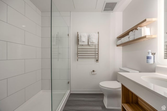 2670 Canyons Resort Dr Unit 331, Park City, UT 84098 - full bathroom with wood finished floors, toilet, baseboards, tiled shower, and vanity