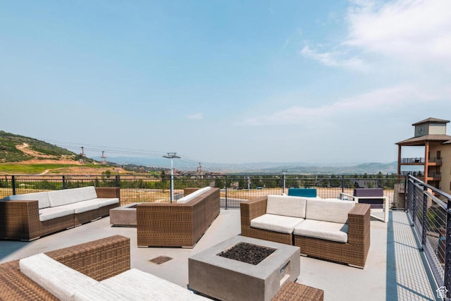 2670 Canyons Resort Dr Unit 331, Park City, UT 84098 - view of patio with an outdoor living space with a fire pit and a mountain view