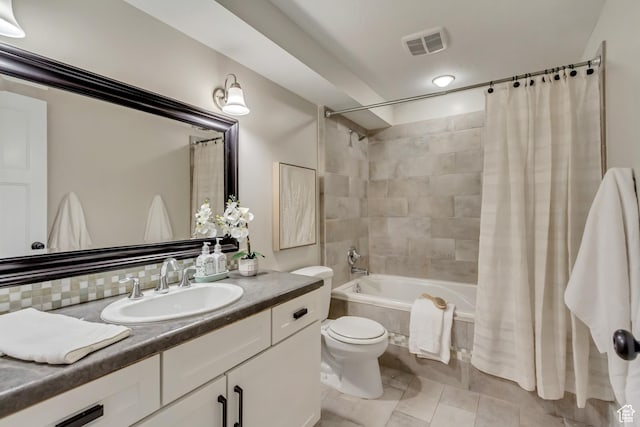 5277 S Morning Mesa Cir, Salt Lake City, UT 84123 - bathroom featuring tiled shower / bath, toilet, vanity, and tile patterned floors