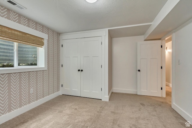 5277 S Morning Mesa Cir, Salt Lake City, UT 84123 - unfurnished bedroom featuring carpet, wallpapered walls, baseboards, and a closet