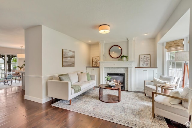 5277 S Morning Mesa Cir, Salt Lake City, UT 84123 - living room with dark wood-style floors, a fireplace, and baseboards
