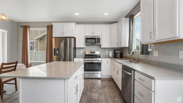 3734 W 2750 N, Lehi, UT 84043 - kitchen with stainless steel appliances, a sink, healthy amount of natural light, dark wood-style floors, and recessed lighting