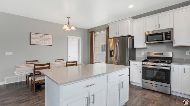 3734 W 2750 N, Lehi, UT 84043 - kitchen featuring stainless steel appliances, dark wood-style floors, white cabinetry, and light stone countertops