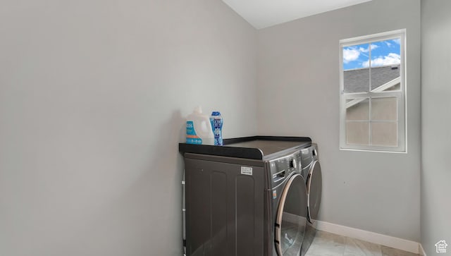 3734 W 2750 N, Lehi, UT 84043 - clothes washing area with washing machine and clothes dryer and baseboards