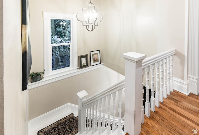 914 E 1st Ave, Salt Lake City, UT 84103 - stairs with a chandelier and wood finished floors