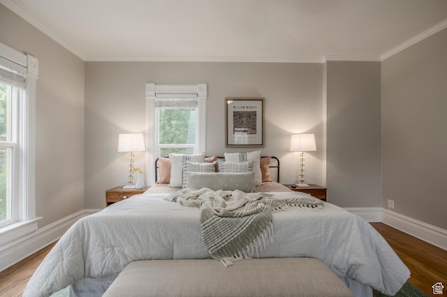 914 E 1st Ave, Salt Lake City, UT 84103 - bedroom with crown molding, multiple windows, wood finished floors, and baseboards