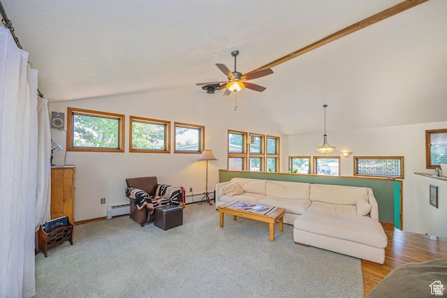 carpeted living area with lofted ceiling, ceiling fan, and baseboard heating