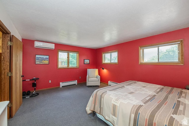 bedroom featuring baseboard heating, a wall unit AC, and carpet floors