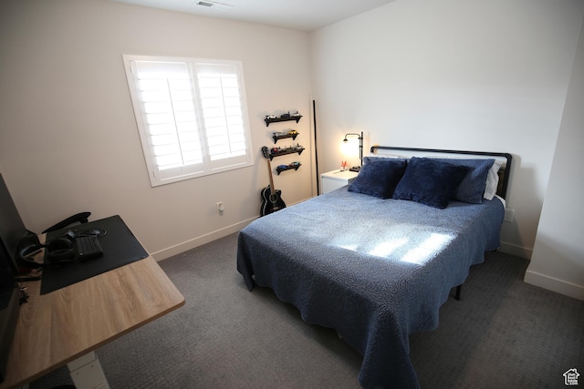 bedroom with carpet and baseboards