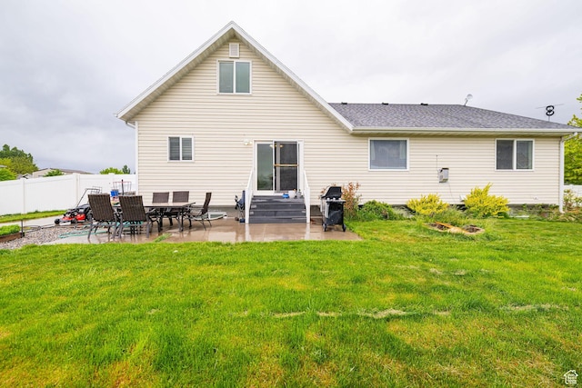 back of house with a patio