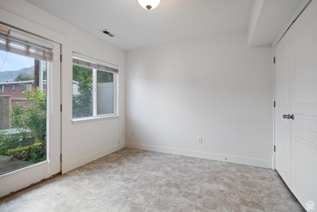 381 S State St E Unit 12, Provo, UT 84606 - unfurnished room with a mountain view and baseboards