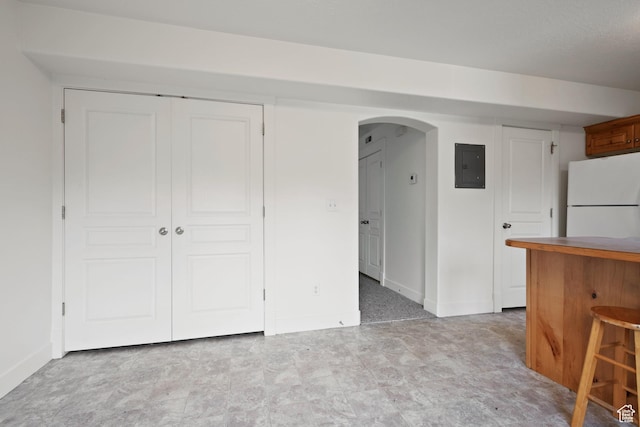 381 S State St E Unit 12, Provo, UT 84606 - interior space featuring electric panel, arched walkways, and baseboards