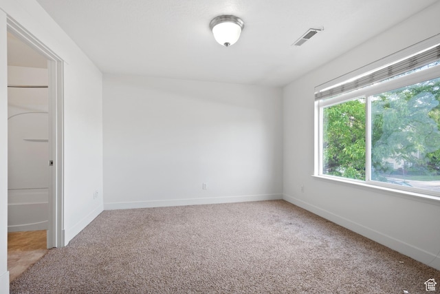 381 S State St E Unit 12, Provo, UT 84606 - empty room with light carpet and baseboards