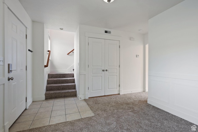 381 S State St E Unit 12, Provo, UT 84606 - entryway featuring light colored carpet and stairway