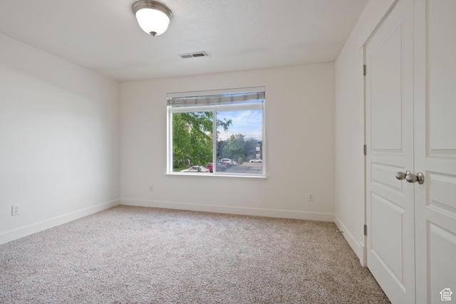 381 S State St E Unit 12, Provo, UT 84606 - unfurnished room featuring light colored carpet and baseboards