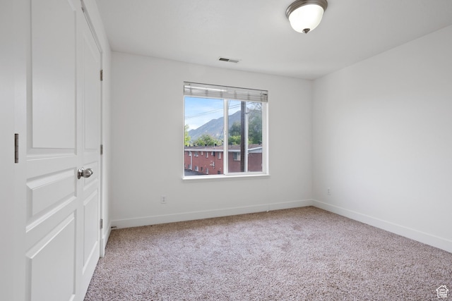 381 S State St E Unit 12, Provo, UT 84606 - spare room with carpet floors and baseboards