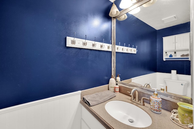 13856 S Cromwell Ln E, Draper, UT 84020 - bathroom with a wainscoted wall and vanity