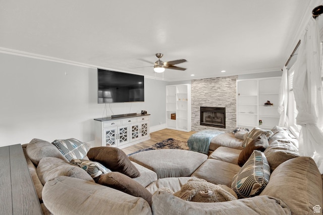 13856 S Cromwell Ln E, Draper, UT 84020 - living area with ceiling fan, ornamental molding, built in features, baseboards, and light wood-style flooring