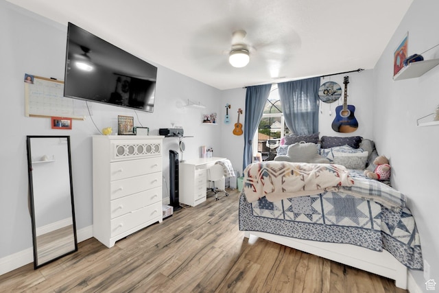 13856 S Cromwell Ln E, Draper, UT 84020 - bedroom featuring wood finished floors, baseboards, and ceiling fan