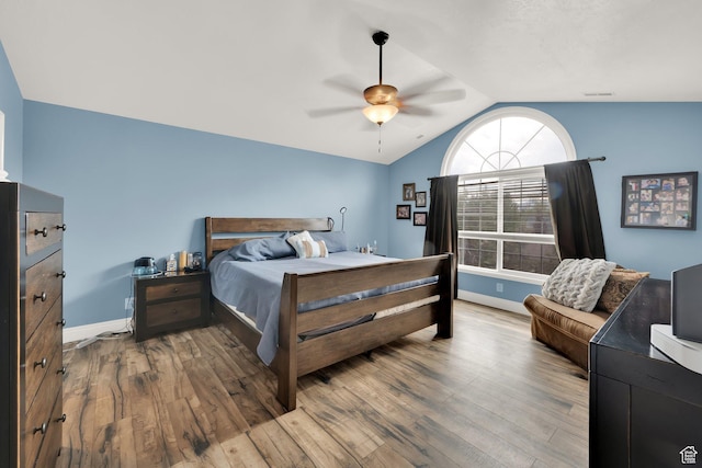 13856 S Cromwell Ln E, Draper, UT 84020 - bedroom featuring lofted ceiling, wood finished floors, baseboards, and ceiling fan