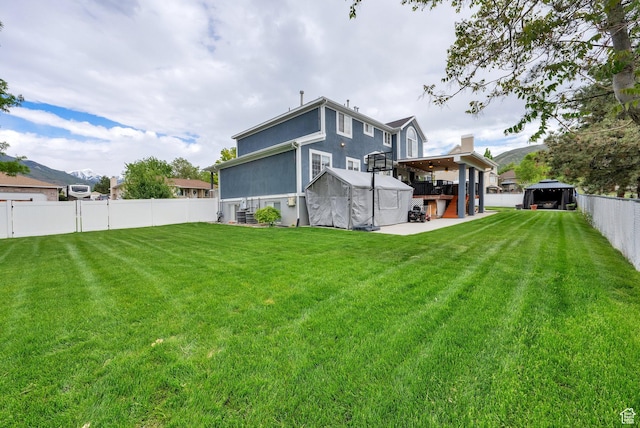 13856 S Cromwell Ln E, Draper, UT 84020 - back of house featuring a storage shed and an outdoor structure
