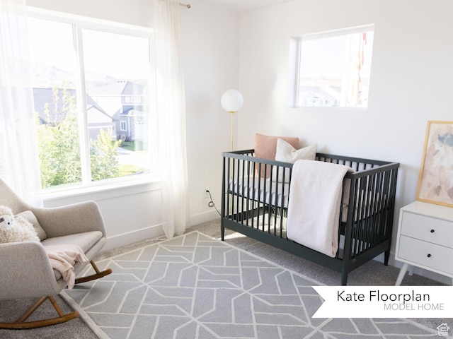 1051 N 3685 W Unit 250, Lehi, UT 84043 - bedroom featuring carpet, baseboards, and a nursery area