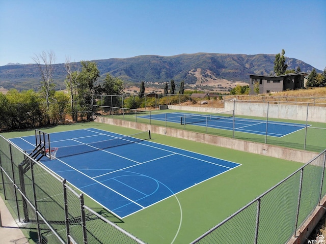 3615 N Wolf Lodge Dr Unit 1109, Eden, UT 84310 - view of tennis court featuring fence, community basketball court, and a mountain view