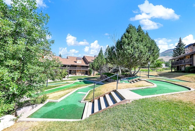 3615 N Wolf Lodge Dr Unit 1109, Eden, UT 84310 - view of home's community with an area to practice putting and a mountain view