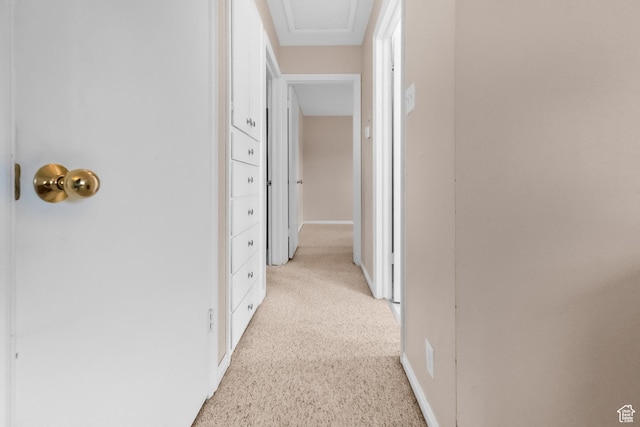 corridor featuring baseboards