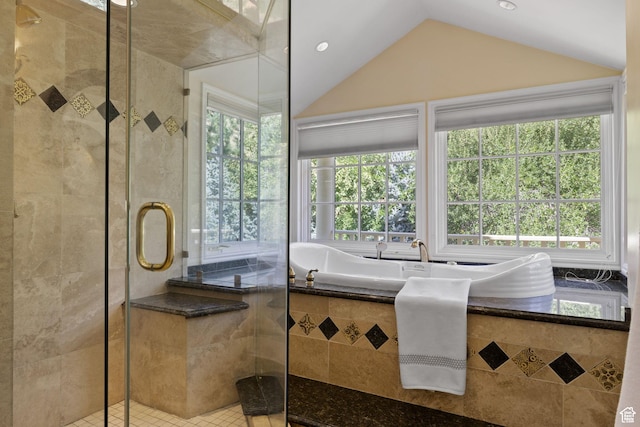 full bathroom with plenty of natural light, a shower stall, lofted ceiling, tile patterned flooring, and recessed lighting
