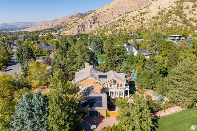 view of subject property featuring a mountainous background