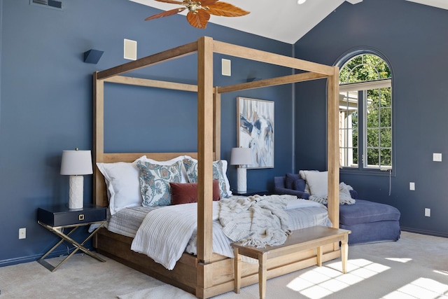 bedroom featuring carpet flooring, vaulted ceiling, baseboards, and ceiling fan
