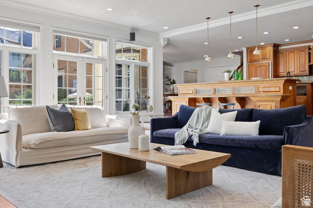 carpeted living area featuring crown molding and recessed lighting