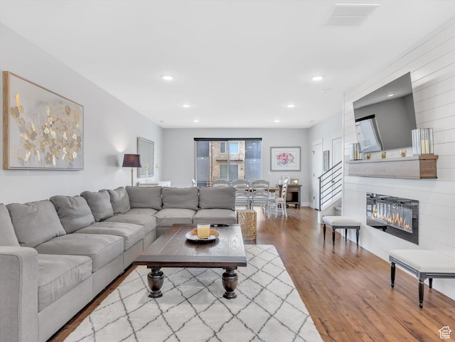 1374 Gambel Oak Way, Park City, UT 84098 - living room featuring wood finished floors, recessed lighting, and a glass covered fireplace