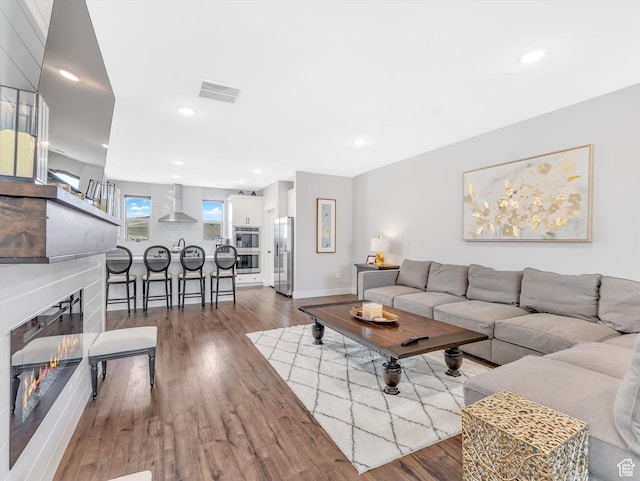 1374 Gambel Oak Way, Park City, UT 84098 - living area with a glass covered fireplace, wood finished floors, baseboards, and recessed lighting