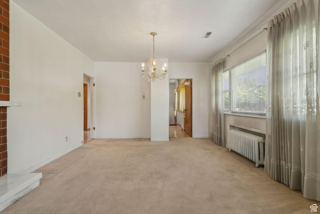 1435 S 500 E, Salt Lake City, UT 84105 - unfurnished dining area with radiator, a chandelier, light carpet, and baseboards