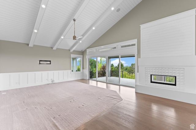 1769 View Ct, Fruit Heights, UT 84037 - unfurnished living room with high vaulted ceiling, a tile fireplace, wood finished floors, beamed ceiling, and wood ceiling