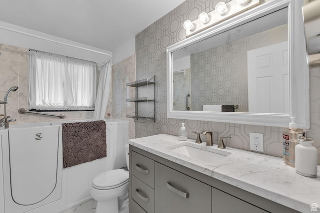 492 W Highland Dr, Riverdale, UT 84405 - bathroom featuring vanity, toilet, marble look tile flooring, a bath, and a shower
