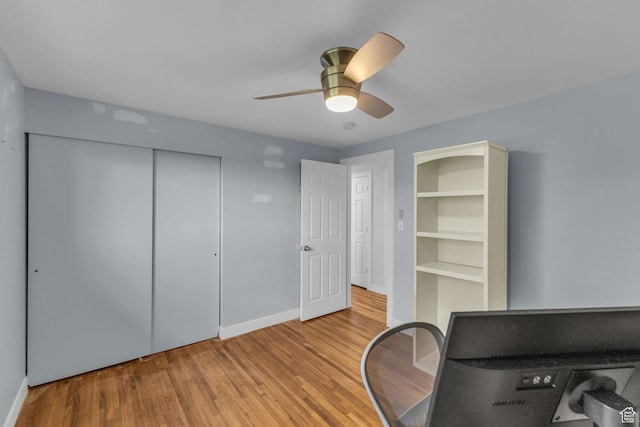 492 W Highland Dr, Riverdale, UT 84405 - home office with a ceiling fan, wood finished floors, and baseboards
