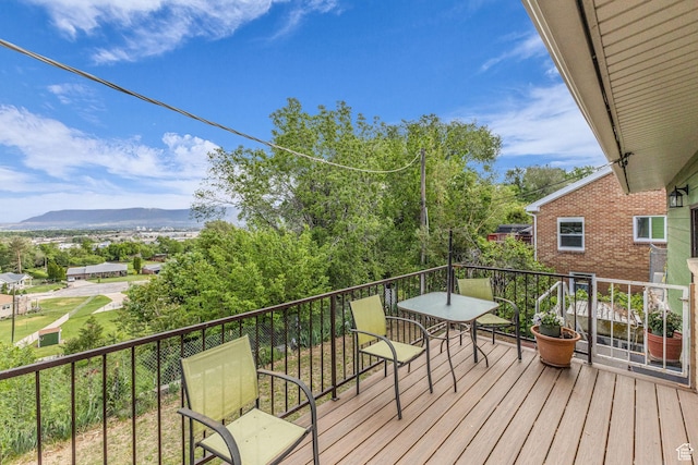 492 W Highland Dr, Riverdale, UT 84405 - deck featuring a mountain view