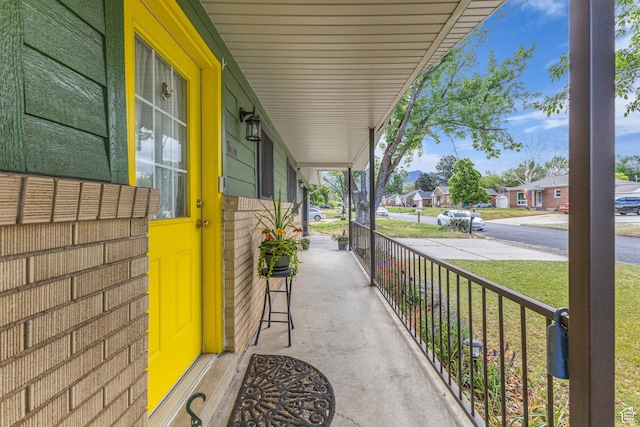 492 W Highland Dr, Riverdale, UT 84405 - view of patio / terrace featuring a porch and a residential view
